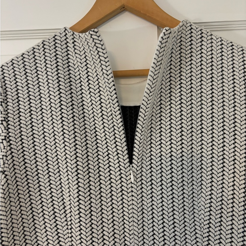 J. McLoughlin Medium blue and white patterned dress.